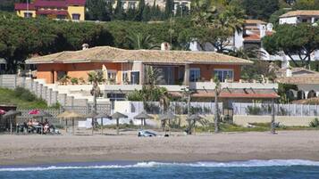 Enjoy breathtaking ocean views from this hillside retreat's spacious balcony.