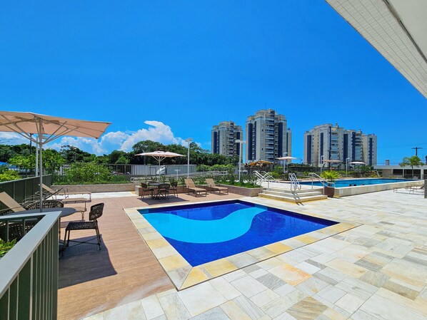 Indoor pool, outdoor pool, pool umbrellas, sun loungers