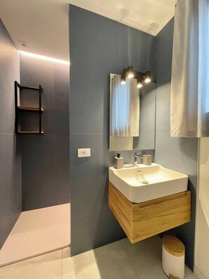 Shower, eco-friendly toiletries, hair dryer, bidet