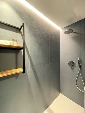 Shower, eco-friendly toiletries, hair dryer, bidet