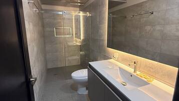 Double Room | Bathroom | Shower, towels, soap, toilet paper