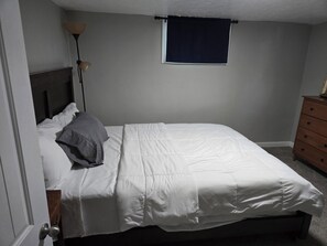 1 bedroom, desk, iron/ironing board, travel crib