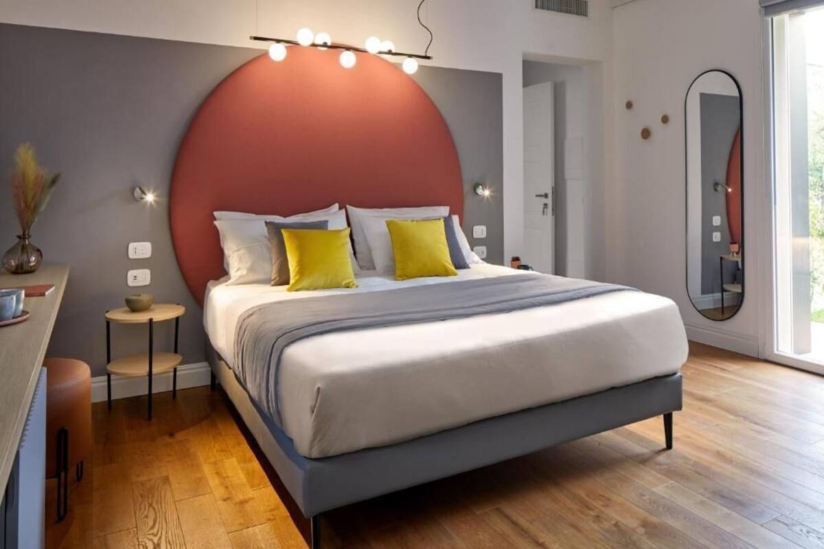 Exclusive Room, 1 Bedroom, Patio | In-room safe, desk, laptop workspace, blackout drapes