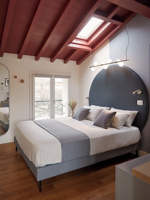 Deluxe Double Room, Courtyard View | In-room safe, desk, laptop workspace, blackout drapes