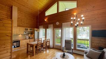Deluxe Chalet, Kitchen, Lake View | Living area | Flat-screen TV, DVD player