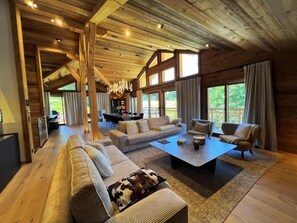 Living area - Chalet, wifi, 50m from ski slopes, view ski slopes, sauna, terrace, balcony, parking, tv, ski locker (Les Gets)