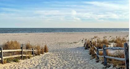 Newly Furnished Sun Drenched Duplex Private Deck Steps to the Beach & Boardwalk!