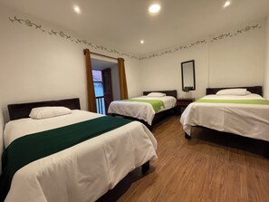 Family Triple Room, 1 Bedroom, Balcony, City View | Free WiFi - Casa Justina (Cusco)