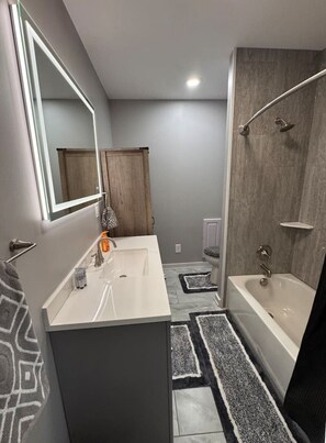 Hair dryer, towels, soap, shampoo