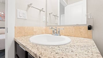 Hair dryer, towels, soap, shampoo