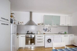 Apartment, Multiple Beds, Patio, Mountain View (Apt Mediterraneo) | Private kitchen | Coffee/tea maker, fridge, microwave, oven - Stylish Lake Maggiore Apartment With Lake Views (Maccagno con Pino e Veddasca)