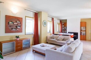 House, Multiple Beds, Pool Access, Pool View (Villa Divignano) | Living area | 42-inch flat-screen TV with digital channels, fireplace - Villa Near Milan With Swimming Pool (Divignano)