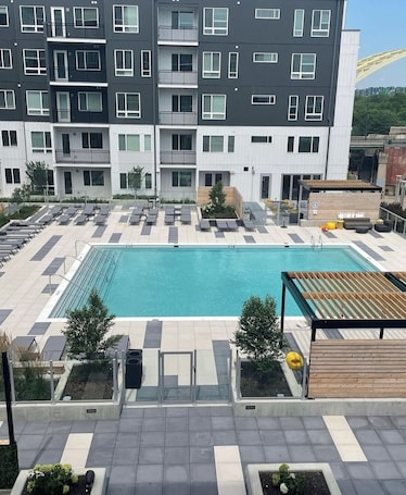 Outdoor pool. The 513 Flat! Pool & River View! Free Gated Parking! Walk to Banks & Stadiums!