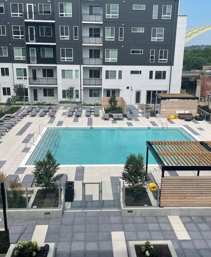The 513 Flat! Pool & River View! Free Gated Parking! Walk to Banks & Stadiums!