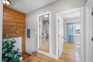 Enjoy a serene retreat with a bathroom and a view of the outdoors.