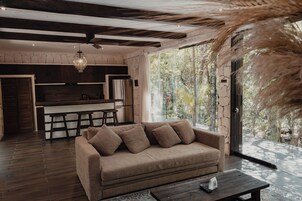 Villa, Multiple Beds, Balcony | Living area | 42-inch flat-screen TV with digital channels