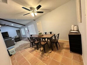 A dining area with a table, chairs, and a ceiling fan. - #3 Charming 4BR 2BA Home in Midland – Comfort, Convenience & Great Location! (Midland)