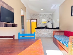 Family Apartment | Living room | 32-inch Smart TV with digital channels