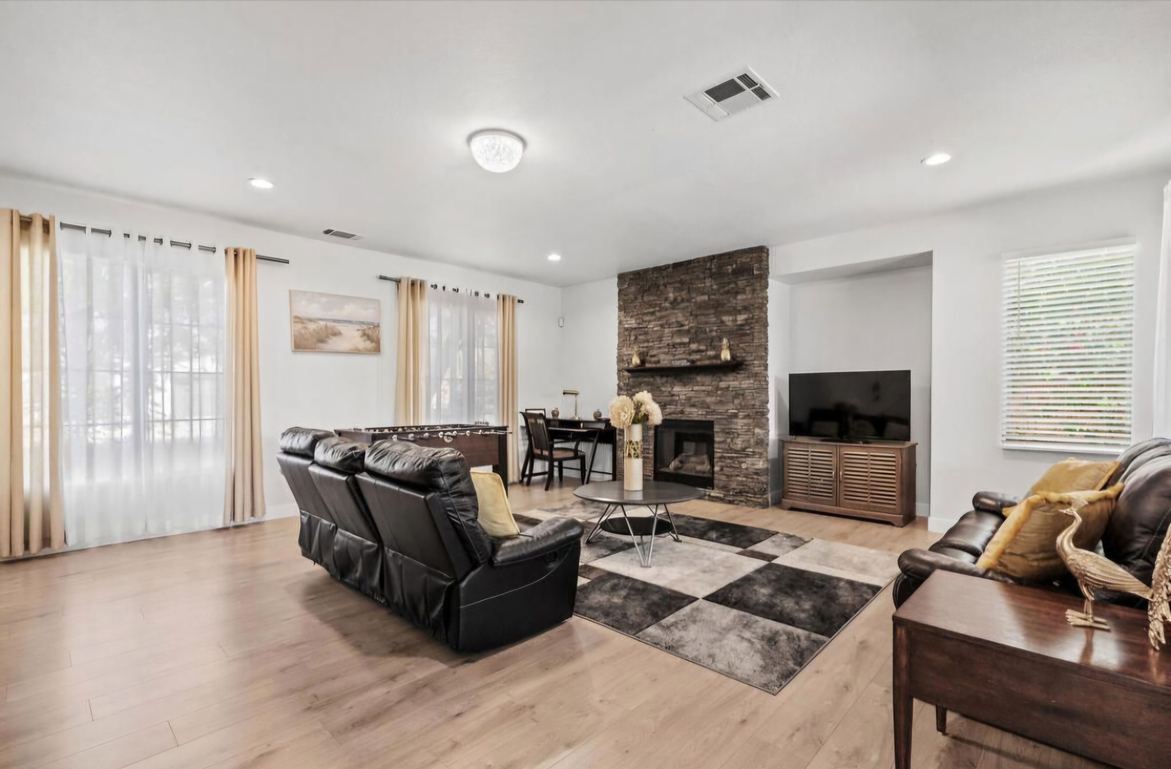 Smart TV, fireplace, foosball