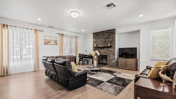 Smart TV, fireplace, foosball