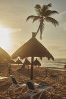Private beach, white sand, beach umbrellas, beach towels