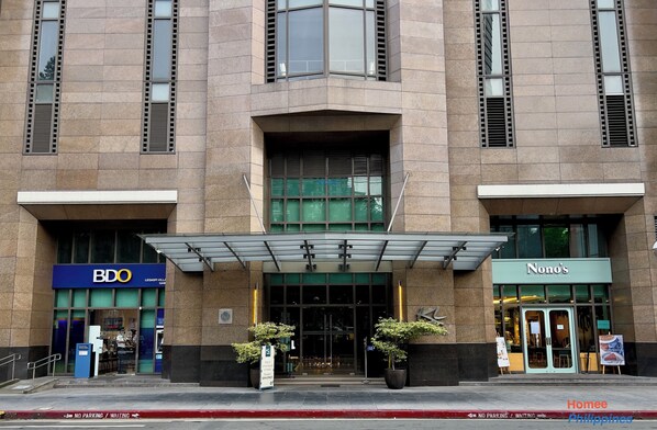 A building with a BDO bank and a restaurant named Nono's.