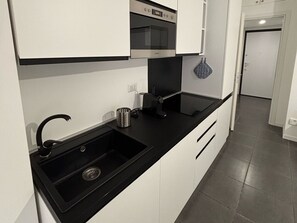 Fridge, stovetop, coffee/tea maker, toaster