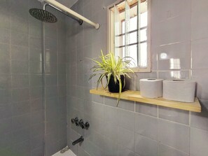 Bidet, towels, toilet paper
