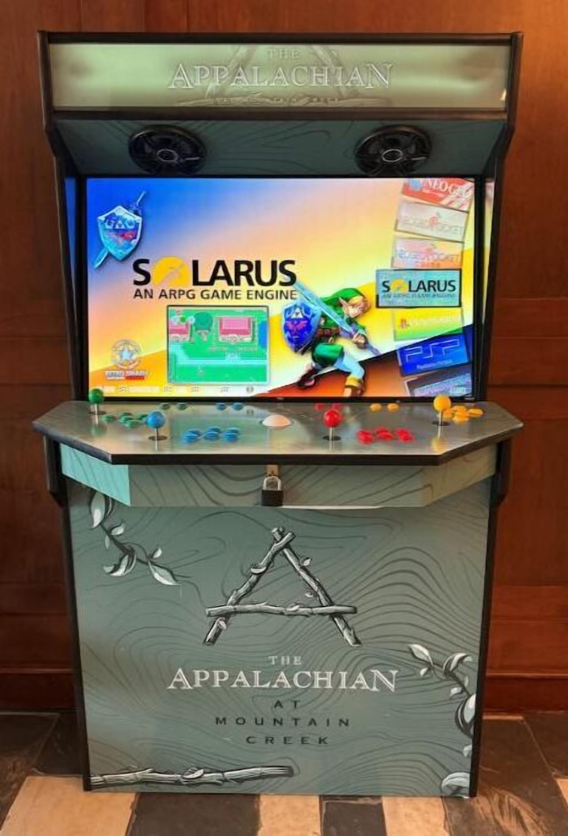 A gaming arcade with a screen displaying 'Solaris' game and a sign for 'The Appalachian Mountain Creek'.
