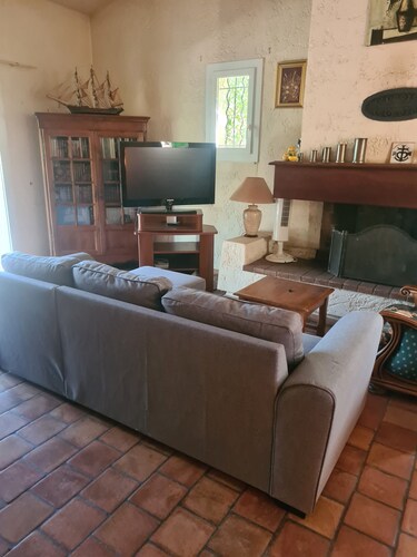 Maison sur terrain ombragée