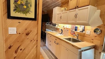 Fridge, cookware/dishes/utensils, paper towels