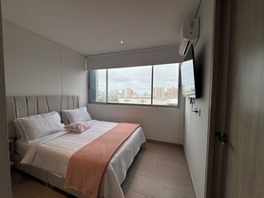 2 dormitorios, tabla de planchar con plancha, wifi y ropa de cama