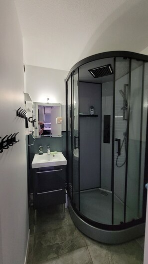 Hair dryer, towels, soap, shampoo
