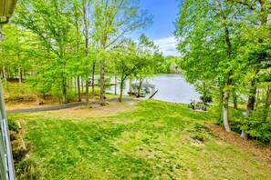 A lakeside view with a gazebo and outdoor seating area. - Lakefront Lake Anna, Boat Dock, Hot Tub, Deck View (Mineral)