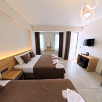 Quarto quádruplo família, sacada, vista para o jardim | Roupas de cama de algodão egípcio, roupas de cama premium