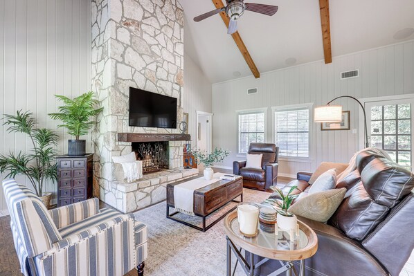 TV, fireplace, books