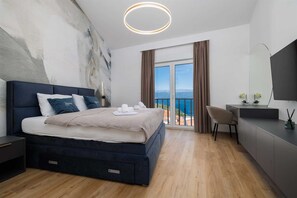 3 quartos, ferros/tábuas de passar roupa, berço de viagem