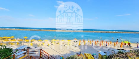 On the beach, white sand