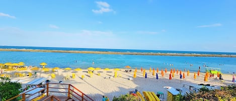 On the beach, white sand