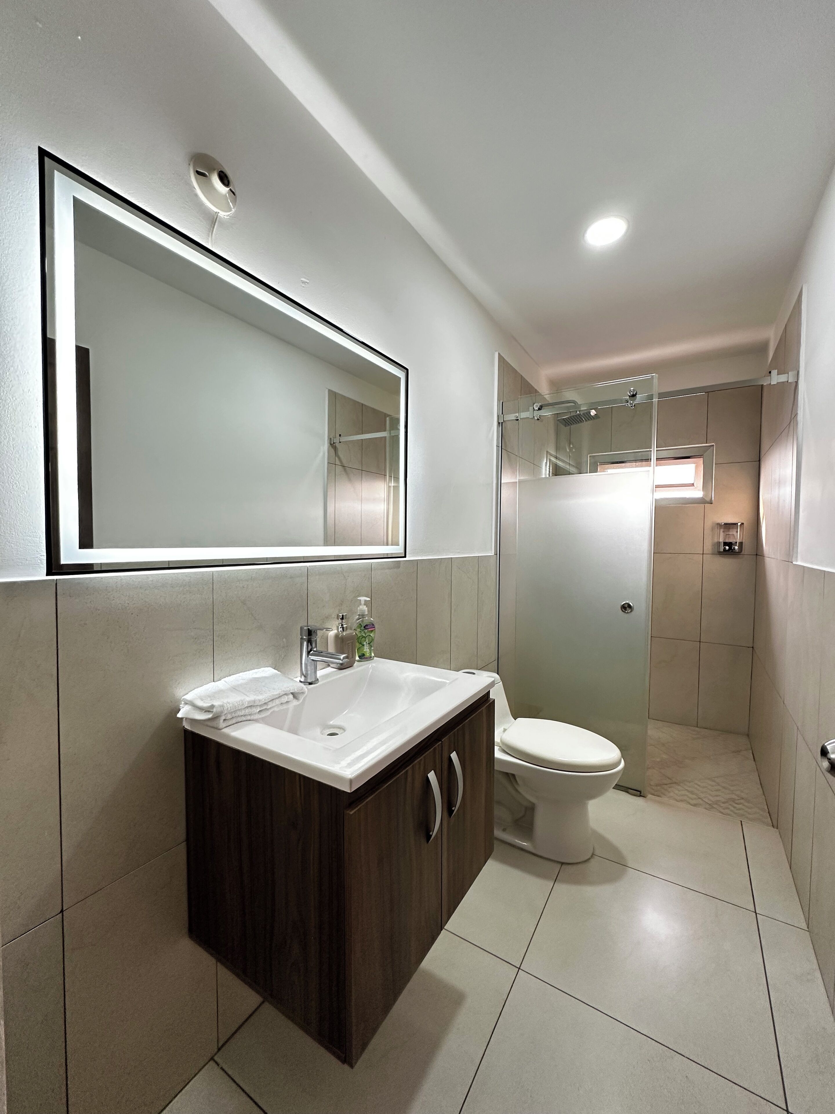 Dutxa, tovalloles, sabó i paper higiènic 