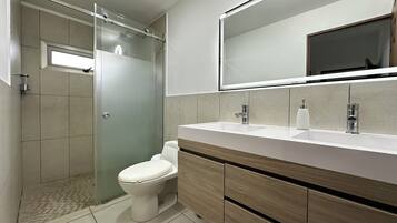 Shower, towels, soap, toilet paper