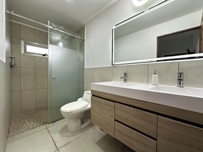 Shower, towels, soap, toilet paper