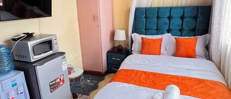 1 غرفة نوم ومكواة/لوح كي وواي فاي وملاءات أسرّة