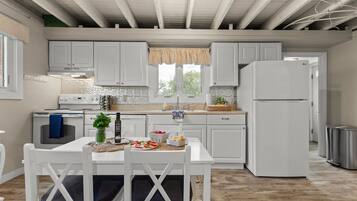 Coffee/tea maker, fridge, microwave, oven
