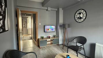 43-inch flat-screen TV with satellite channels