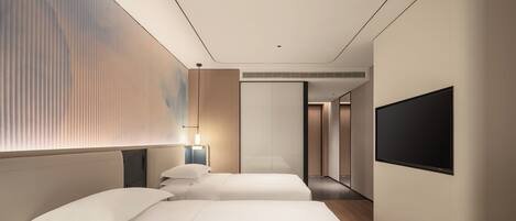 A modern hotel room with two beds, a flat-screen TV, and a large window with blinds.