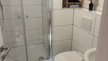 Hair dryer, towels, soap, toilet paper