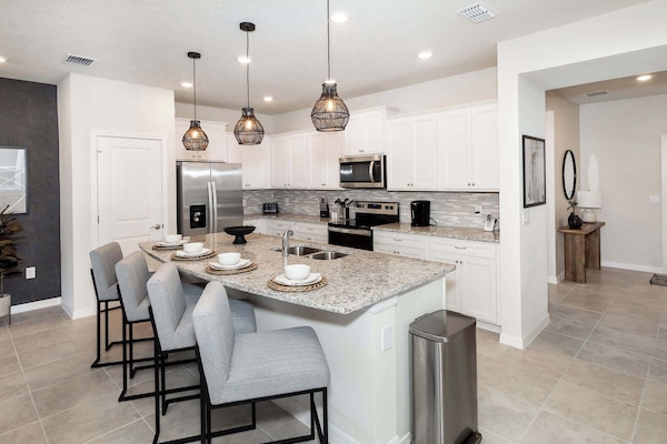 Counter seating for 4 is available off the spacious, updated kitchen