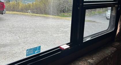 Cozy Camper in Eagle River with hot tub on deck,WiFi, AC & a breathtaking view.