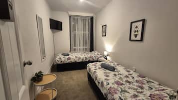 Habitación con 2 camas individuales | Wifi gratis y ropa de cama